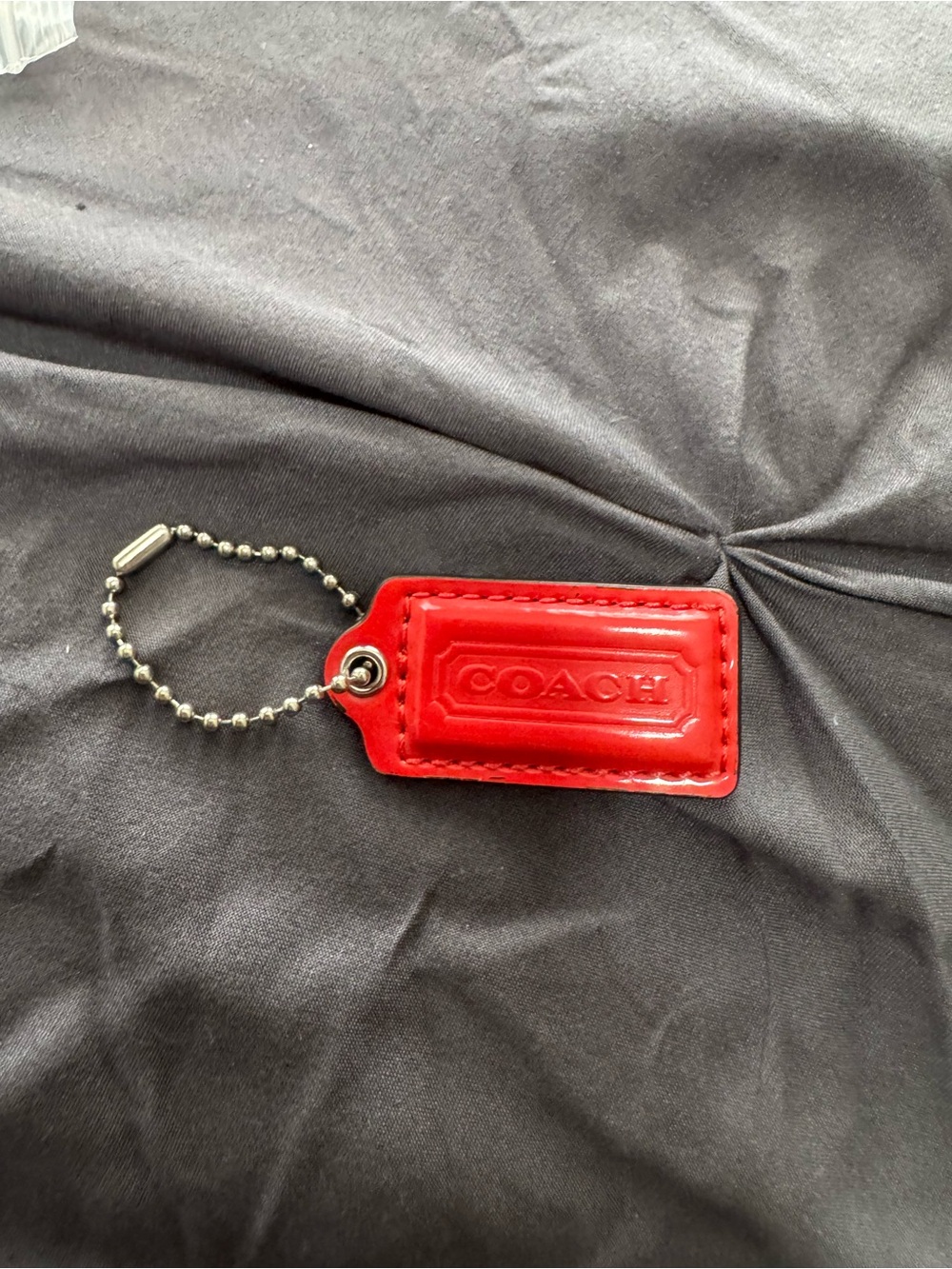 Coach Red Patent Leather hangtag